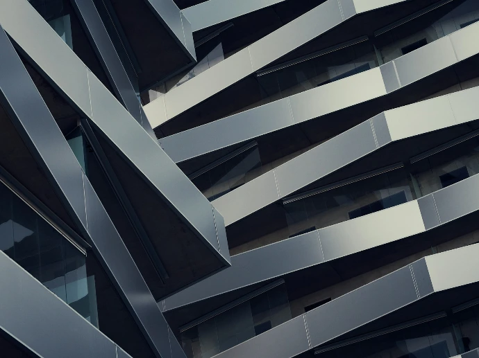 low angle photography of gray building at daytime